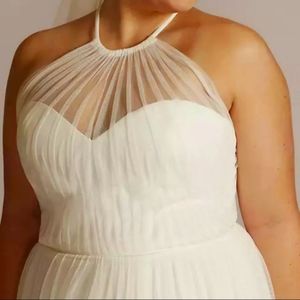 Halter tulle wedding gown with tiered skirt